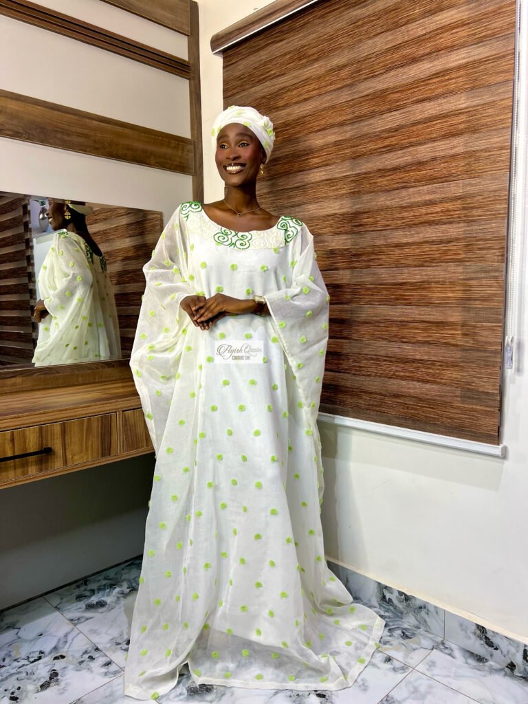 The Ivory Bloom ivory dress with lime-green floral details and embroidered neckline by Ayish Qasim