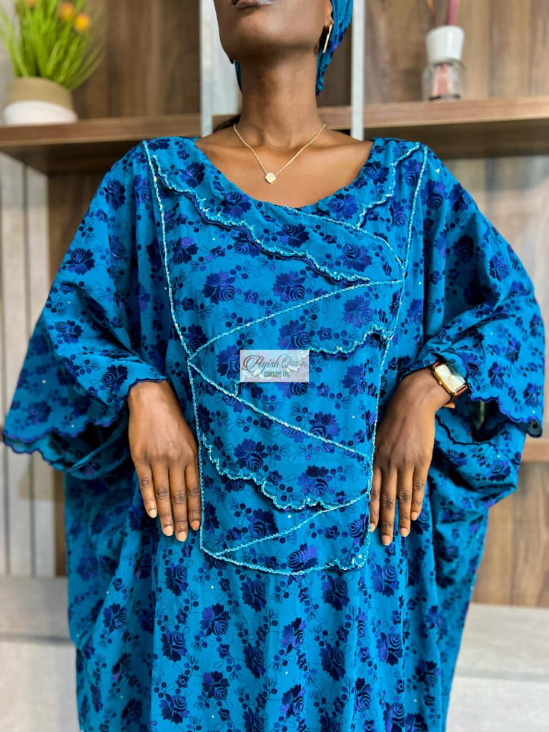 The Sapphire blue floral dress with matching headwrap by Ayish Qasim