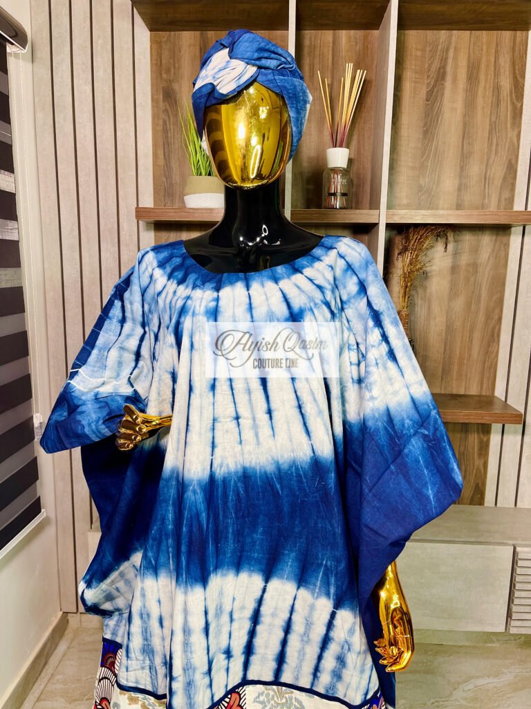 The Adire Cascade blue and white Adire dress with colourful patterned skirt and matching headwrap by Ayish Qasim