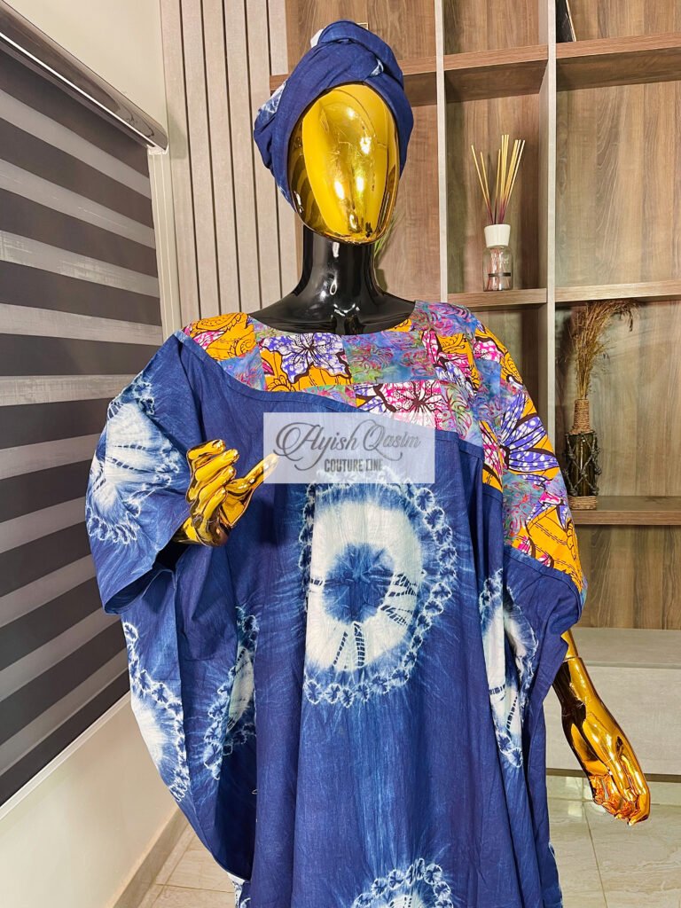 The Adire Reverie indigo Adire-inspired dress with colourful printed accents and matching headwrap by Ayish Qasim