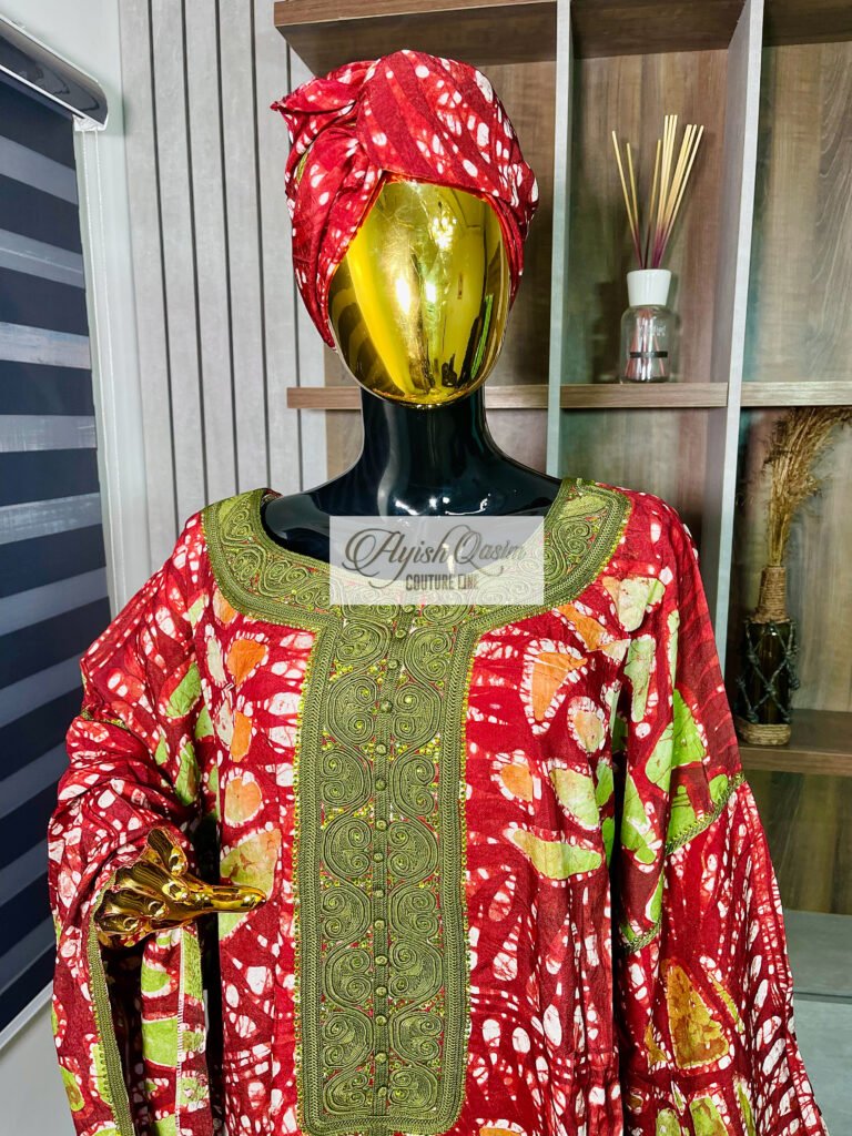The Crimson Garden red African dress with green floral detailing and matching headwrap by Ayish Qasim