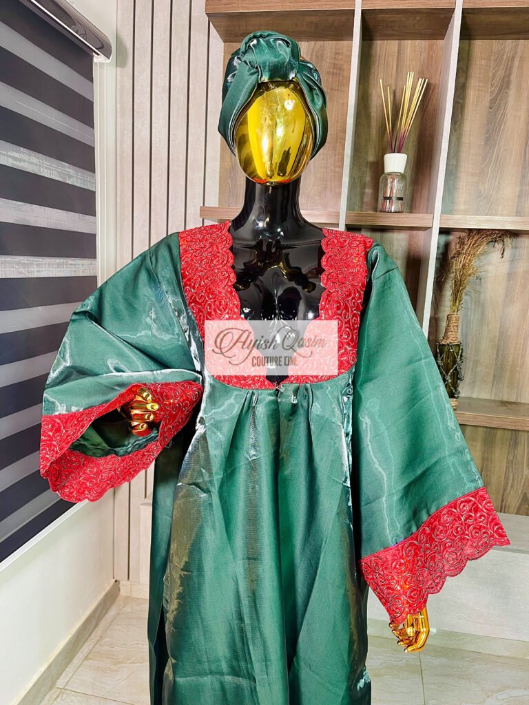 The Crimson Ivy emerald green dress with crimson embroidered detailing and matching headwrap by Ayish Qasim