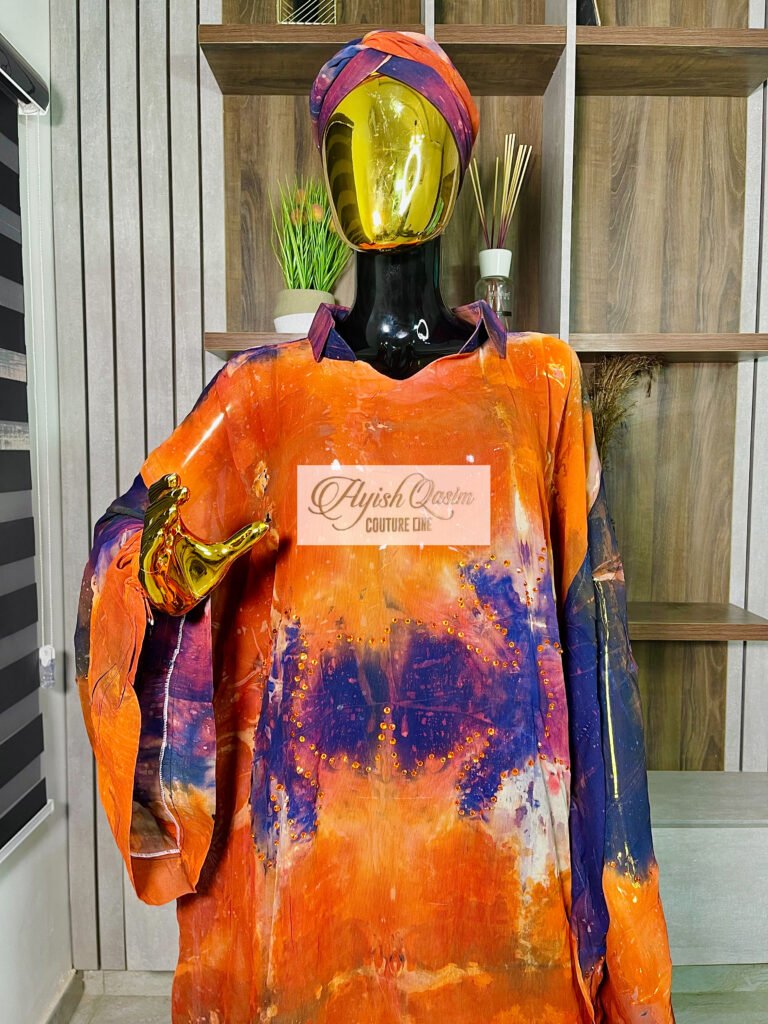 The Ember Muse orange and purple African dress with embellishments and matching headwrap by Ayish Qasim