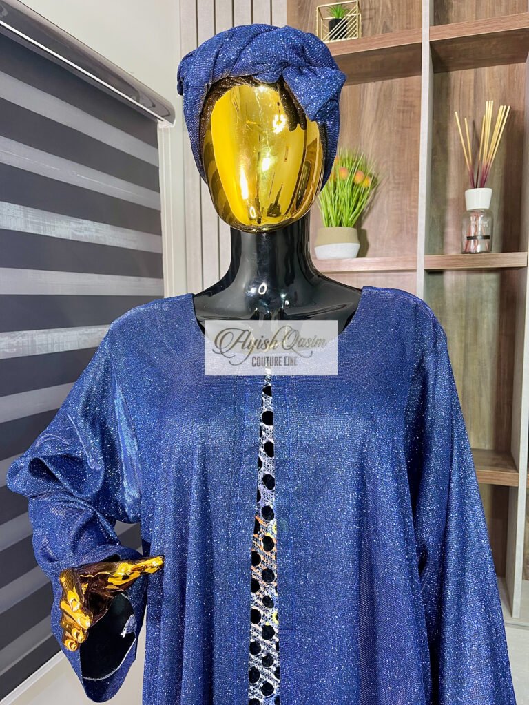 The Midnight Jewel blue shimmer dress with black and silver detailing and matching headwrap by Ayish Qasim