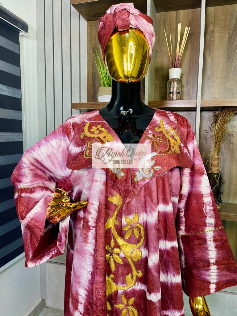 The Rosé Royale rose and burgundy African dress with gold embroidery and matching headwrap by Ayish Qasim